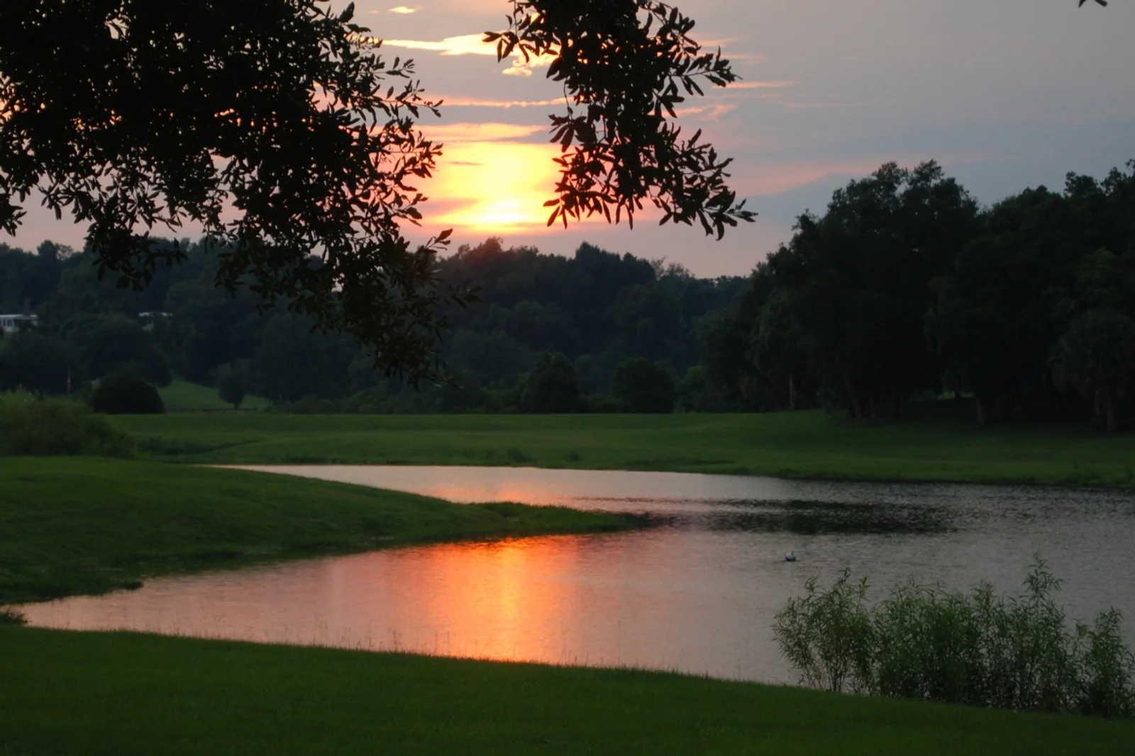 Sunset over a lake at Zellwood Station